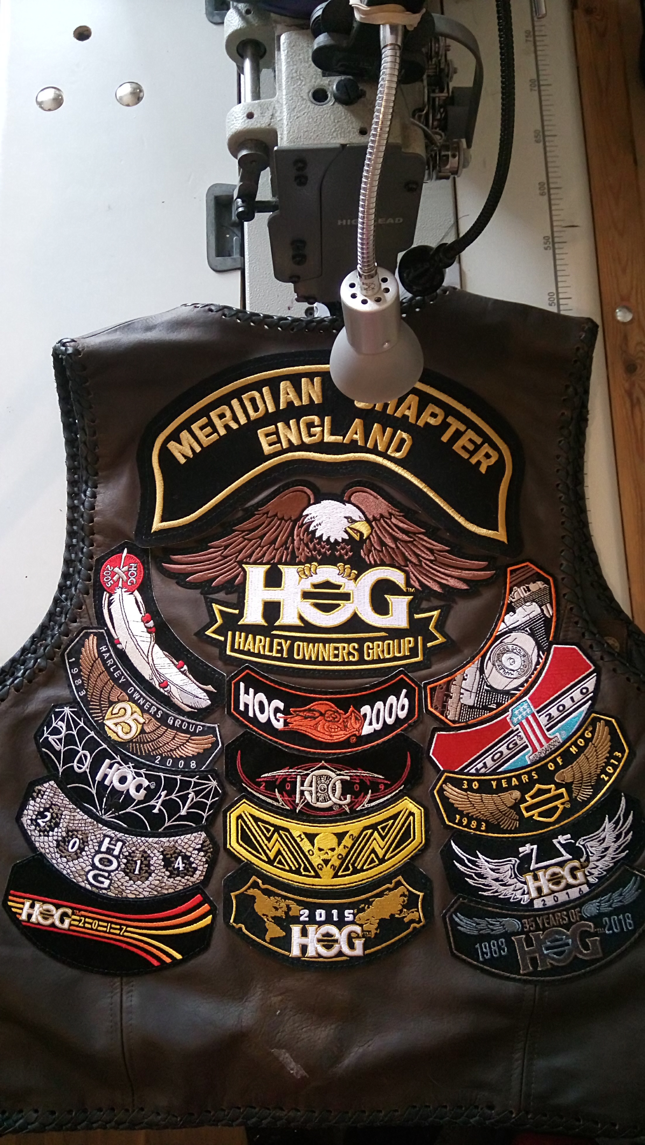 Patches and badges sewn on leathers